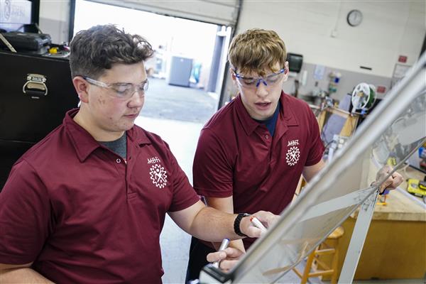 ENGINEERING RELATED TECHNOLOGY students working in lab